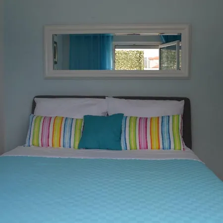 Mimoza 펜션 로고즈니차